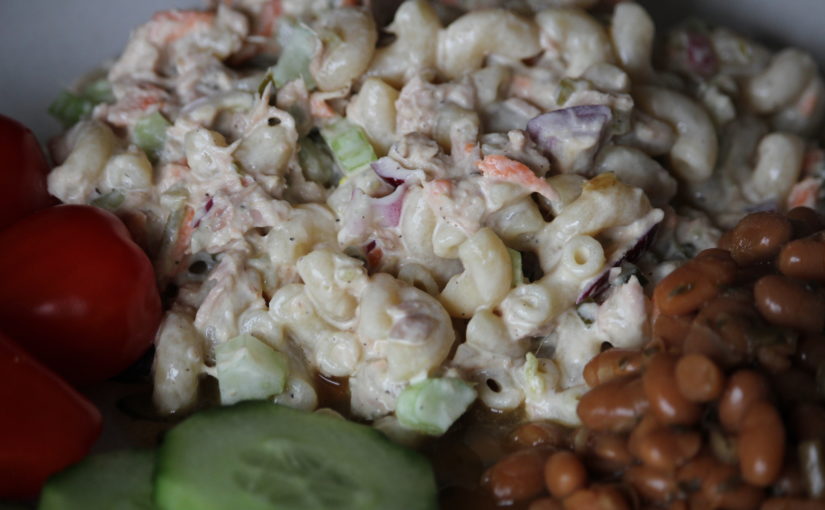Ultimate Macaroni Salad served with baked beans and fresh veggies.