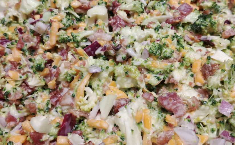 Broccoli Salad - a delicious combination of broccoli, onion, cheese and bacon.